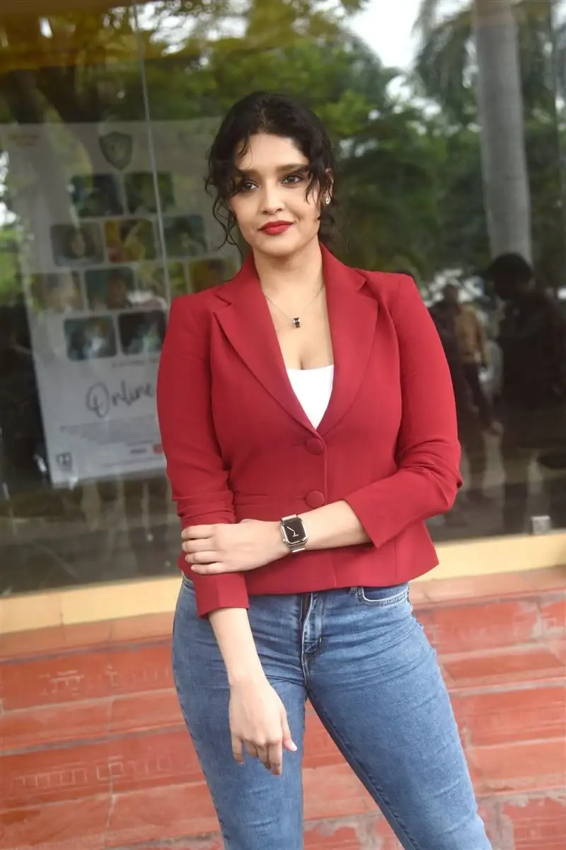 INDIAN ACTRESS RITIKA SINGH SMILING IN RED TOP BLUE JEANS 16